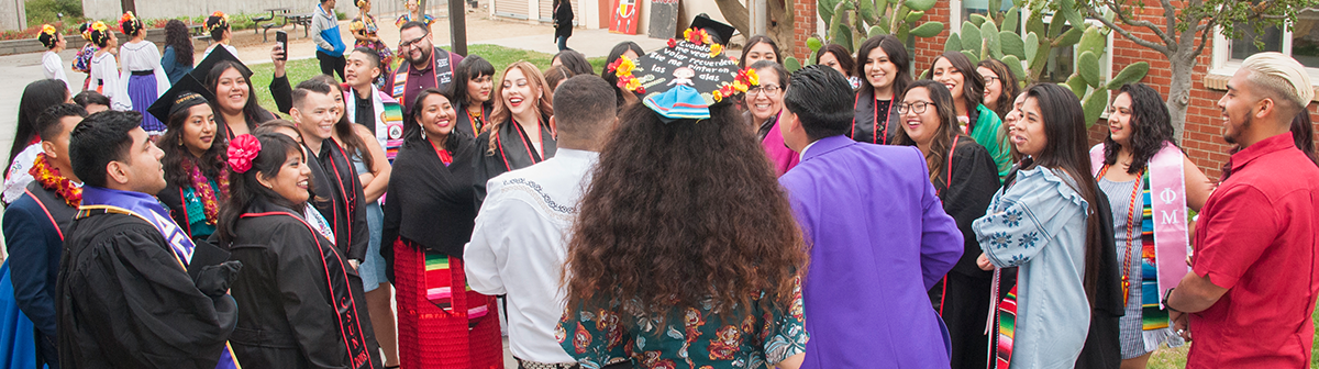 a crowd of graduates celebrate