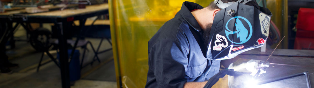 Engineering student welding.