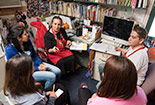 Happy students in a classroom.