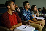 closeup of Students listening to their professor