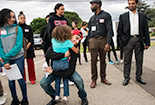 Student standing sround each other outside