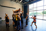 Students doing theatre in a classroom