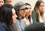 Closeup of a female student focused in class