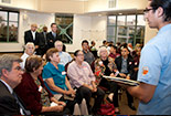 A CSUN Person teaching a group of students