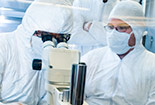 Happy students working in a lab.