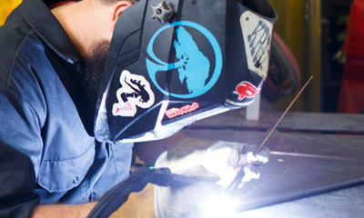 Student welding.