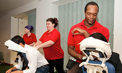 Individuals getting back massages. 