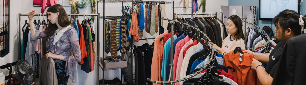Students browing clothes in Matty's Closet store.