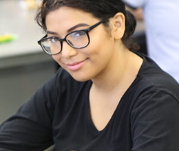 Students talk at a social gathering
